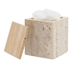 A square beige stone container from the Bowen Natural Bath Collection by Pigeon & Poodle, with a matching lid beside it, holds white cotton balls inside.