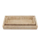 Two rectangular beige stone trays, one nested inside the other, display elegant accessories from the Pigeon & Poodle Bowen Natural Bath Collection on a white background.