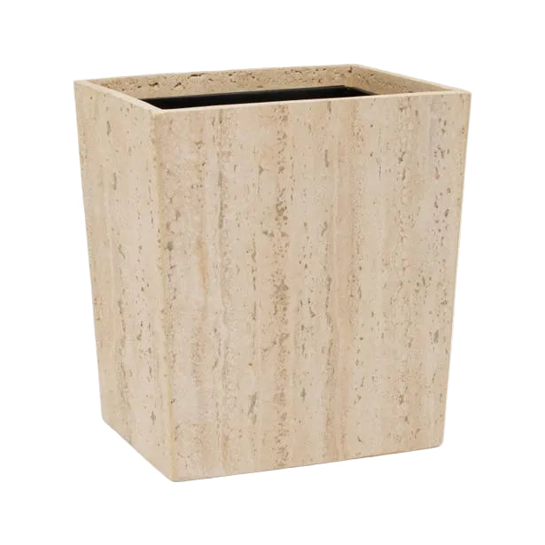 This square, beige planter from Pigeon & Poodle’s Bowen Natural Bath Collection features a smooth, stone-textured surface and open top, inspired by travertine bathroom accessories.