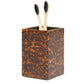 Pigeon & Poodle's Carmel High Gloss Faux Tortoise holder boasts a unique rectangular brown tortoise shell style and comes with two bamboo toothbrushes with black bristles.