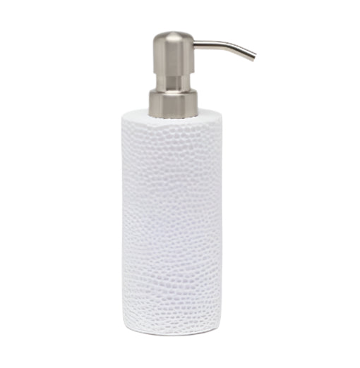 A white textured soap dispenser from the Pigeon & Poodle Dover Bath Collection, made of engraved resin with a silver pump and spout, is displayed against a plain white background.