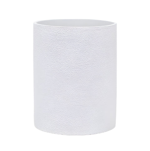 A white cylindrical wastebasket from Pigeon & Poodle’s Dover Bath Collection, featuring subtle textured engraved resin, shown on a white background—an ideal addition to any bathroom.