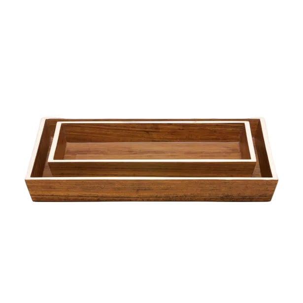 Two Harper Dark Teak trays by Pigeon & Poodle, one nested inside the other, feature elegant details and clean, simple lines.