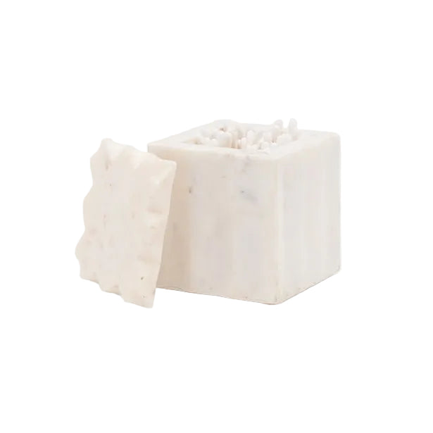 A textured square bar and a matching irregular piece from Pigeon & Poodle's Proviso White Bath Collection add a touch of luxury decor to any bathroom.
