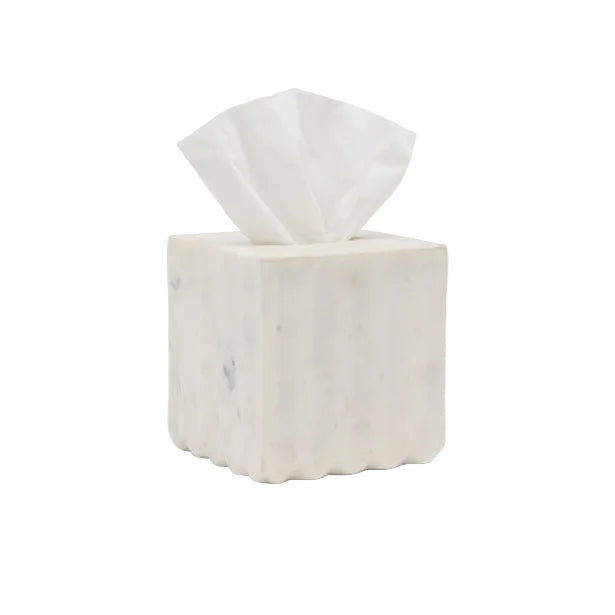 A luxury pleated marble tissue box holder from Pigeon & Poodle’s Proviso White Bath Collection, featuring a single white tissue partially pulled out, is displayed against a plain white background.