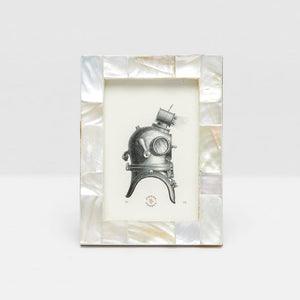 The Lesina Frame Collection by Pigeon & Poodle features a rectangular design with a pearlescent mosaic border, making it an elegant choice for coastal décor and collectors of sophisticated photo frames.