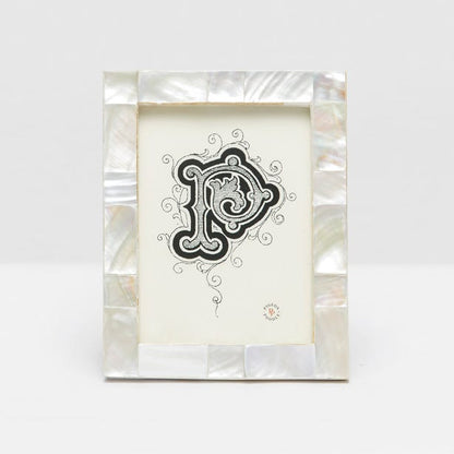 The Lesina Frame Collection by Pigeon & Poodle showcases a decorative black and white letter "P" on white paper in a white kabibe shell frame with mother-of-pearl border, ideal for bringing coastal elegance to your décor.