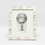 This black and white "LE GEANT" hot air balloon illustration is set in a Pigeon & Poodle Lesina Frame Collection mother-of-pearl mosaic frame, ideal for adding coastal charm to your space.