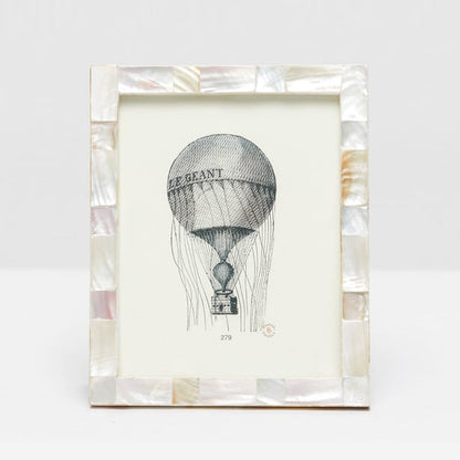 This black and white "LE GEANT" hot air balloon illustration is set in a Pigeon & Poodle Lesina Frame Collection mother-of-pearl mosaic frame, ideal for adding coastal charm to your space.