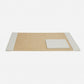 The Asby Desk Accessory Collection by Pigeon & Poodle features a rectangular tan full-grain leather desk pad with white edges and a matching white notepad—a sophisticated accent for any workspace.
