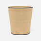 The Hanford Desk Accessory Collection by Pigeon & Poodle features a beige woven raffia wastebasket with black trim on the top and bottom, shown against a plain white background.