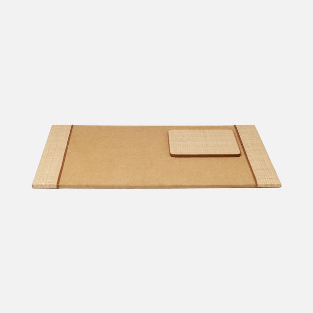 The Hanford Desk Accessory Collection by Pigeon & Poodle features a rectangular raffia mat and matching small cushion displayed side by side against a plain white background.