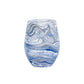 The Juliska Puro Marbled Drinkware Collection features a clear glass tumbler with swirling blue and grey patterns evoking seaglass hues, set against a plain white background.