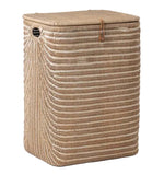 The Mocha Whitewashed Lorain Hamper by Pigeon & Poodle features horizontal rattan weaving, a braided strap closure, and a lid, displayed against a white background.
