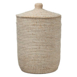 The Roslyn Hamper by Pigeon & Poodle features a cylindrical design with a lid and is crafted from whitewashed seagrass in a tight, uniform weave—ideal for stylish, natural storage.