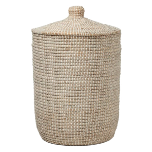 The Roslyn Hamper by Pigeon & Poodle features a cylindrical design with a lid and is crafted from whitewashed seagrass in a tight, uniform weave—ideal for stylish, natural storage.