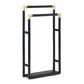 The PIG, Bolzano Towel Rack by Pigeon & Poodle features a black freestanding design with two staggered bars and beige corner accents, bringing subtle coastal style to your bathroom.