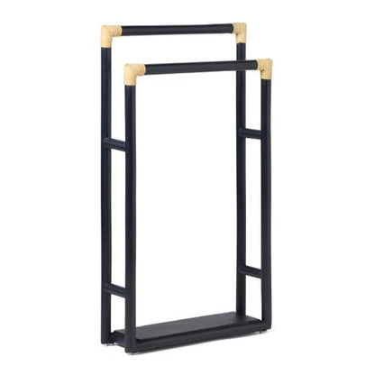 The PIG, Bolzano Towel Rack by Pigeon & Poodle features a black freestanding design with two staggered bars and beige corner accents, bringing subtle coastal style to your bathroom.