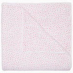 A folded white coverlet from the Hand-Stitched Bedding Collection by John Robshaw, crafted from soft organic cotton and featuring a subtle pattern of evenly spaced small red stitches, is displayed on a plain background.