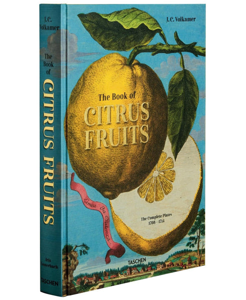 Cover of Taschen's "The Book of Citrus" features an intricately etched copper plate illustration with a large citrus and a sliced fruit, adorned with decorative text. The elegant design echoes the grandeur of Italian villas, set on a serene blue background.