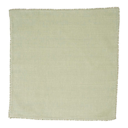 The Juliska Berry Trim Napkin Collection features a plain, light green woven cotton napkin with a fine stitched border, shown laid flat against a white background.
