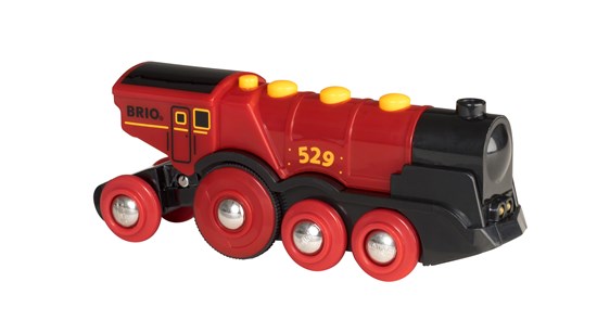 The Mighty Red Action Locomotive, a red and black toy train, is shown on a white background.