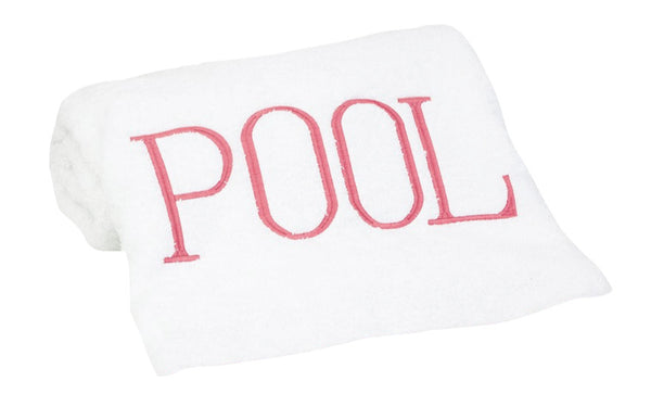 White cotton terry Hamburg House Pool Towel with the word "pool" embroidered in red.