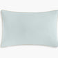 The Gooselings Dino Dreams Toddler Pillow is a rectangular light blue kids’ pillow with beige piping, ideal for children’s bedding, shown on a plain white background.