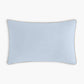 The Transit Treasures Toddler Pillow by Gooselings features a rectangular light blue design with brown piping, perfect for sweet dreams. Displayed on a plain white background.
