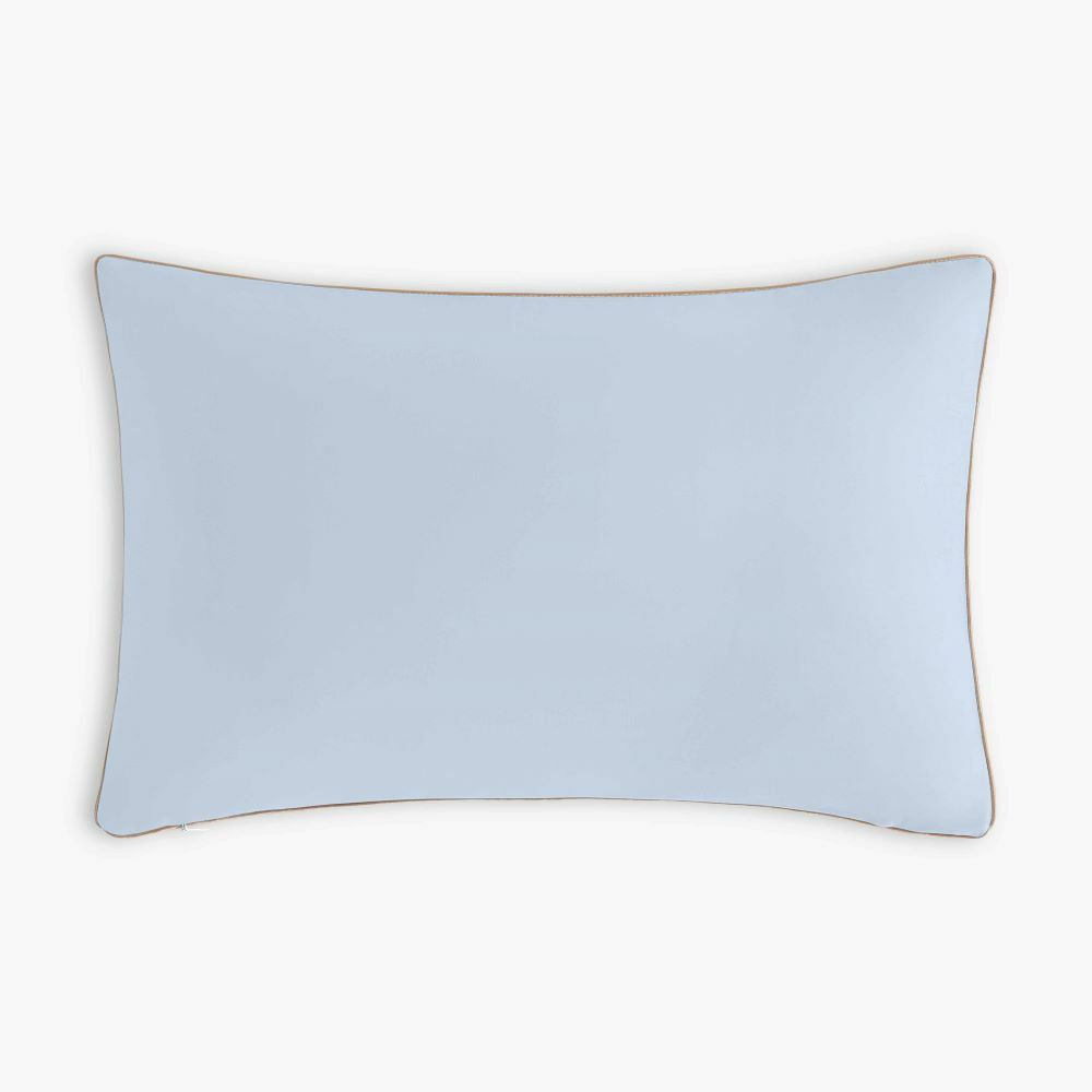 The Transit Treasures Toddler Pillow by Gooselings features a rectangular light blue design with brown piping, perfect for sweet dreams. Displayed on a plain white background.