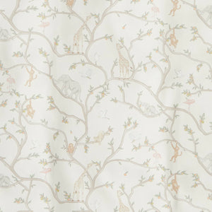 The Animal Parade Ivory Bedding Collection by Gooselings features adorable tree branches with giraffes, elephants, monkeys, birds, and leaves—perfect to pair with kids pillows for a dreamy children’s room.