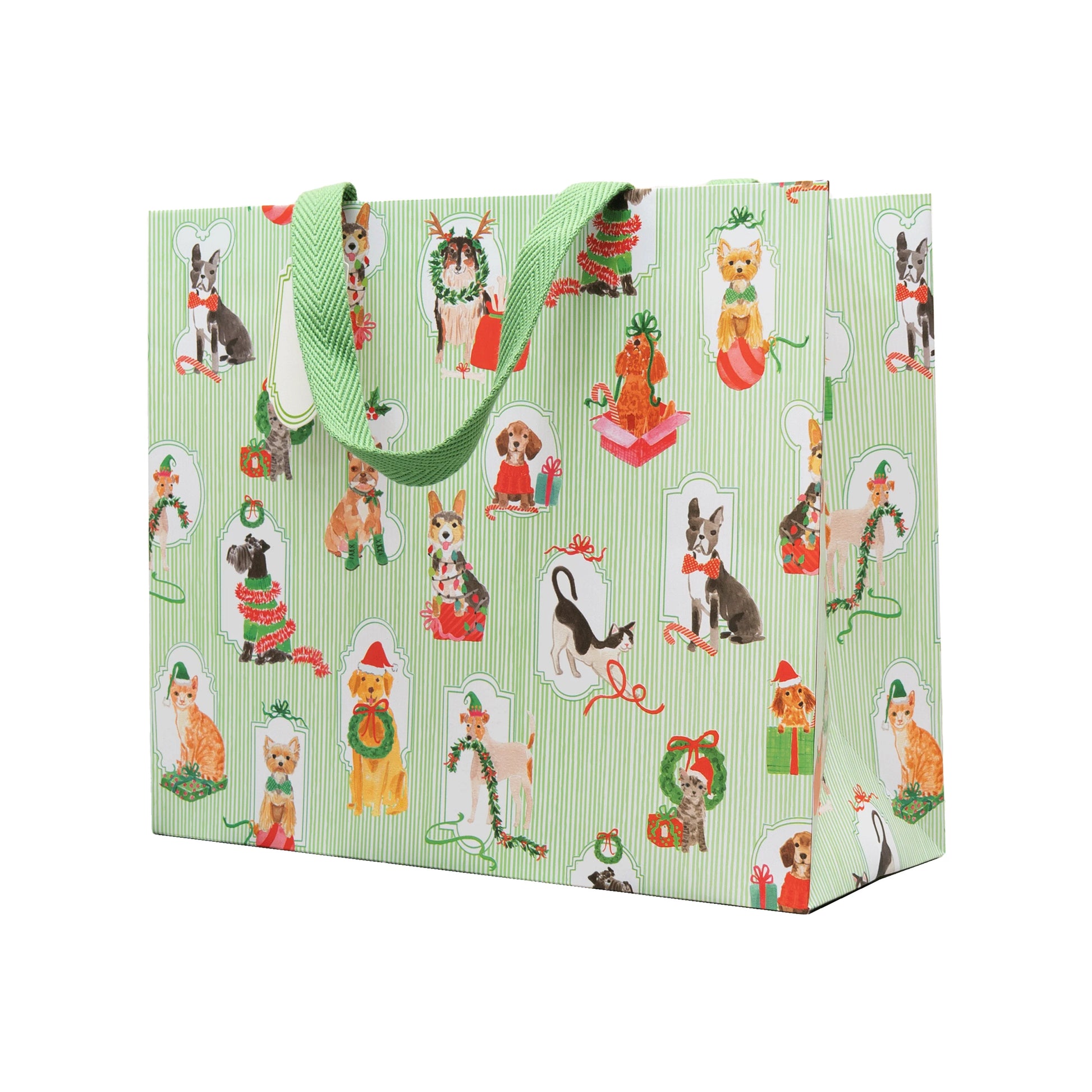 The Presenting Pets Collection large gift bag by Caspari, featuring festive dogs and green handles, pairs perfectly with elegant paper plates or other disposable tableware for your next celebration.