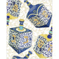 Add a festive touch to your Hanukkah holiday gifts with Caspari’s Patterned Dreidel Collection—illustrated blue-and-gold dreidels adorned with ornate patterns and Hebrew letters, set against an elegant floral white and gold background.