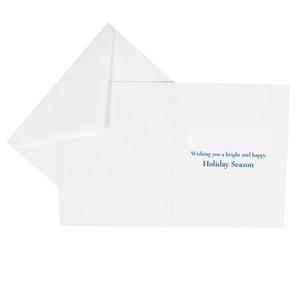 The Caspari Menorah Card Set features an open white FSC-certified holiday card with “Wishing you a bright and happy Holiday Season” in blue on the right, paired with a matching envelope and crafted by a Swiss printer.