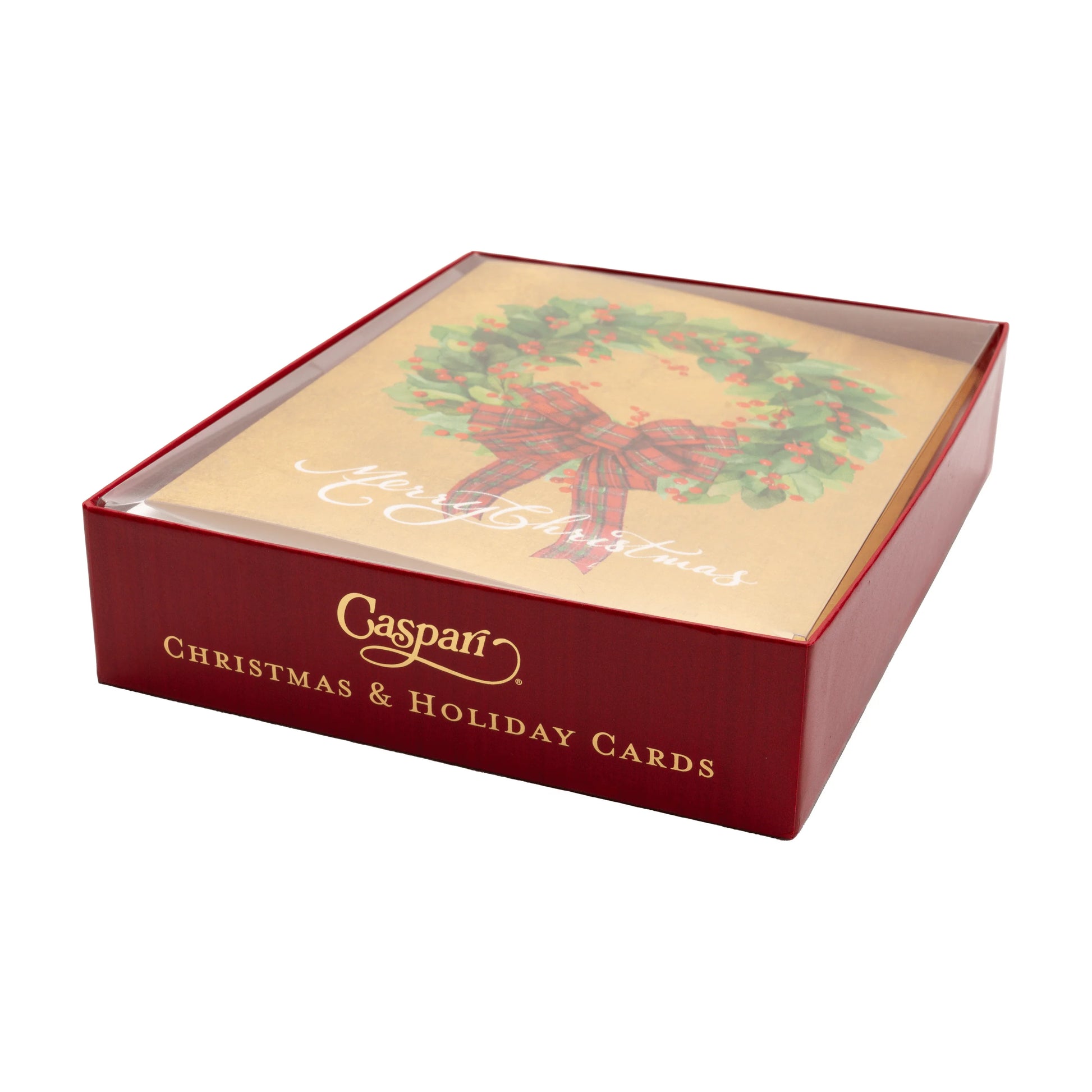 The Caspari Leaf Wreath with Plaid Bow Boxed Card Set features elegant Christmas cards with a wreath design and plaid bow, beautifully packaged in a red box with gold lettering.
