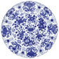 The Delft Blue Collection by Caspari features round porcelain plates with blue floral designs on white, paired with eco-friendly triple-ply napkins—perfect for an elegant table setting.