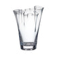 Hand-blown clear glass vase from the Anemone Vase Collection by Simon Pearce, featuring a smooth surface and uneven, wavy rim—ideal for striking flower arrangements. Shown against a white background.