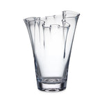 Hand-blown clear glass vase from the Anemone Vase Collection by Simon Pearce, featuring a smooth surface and uneven, wavy rim—ideal for striking flower arrangements. Shown against a white background.