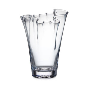 Hand-blown clear glass vase from the Anemone Vase Collection by Simon Pearce, featuring a smooth surface and uneven, wavy rim—ideal for striking flower arrangements. Shown against a white background.