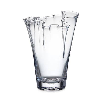 Hand-blown clear glass vase from the Anemone Vase Collection by Simon Pearce, featuring a smooth surface and uneven, wavy rim—ideal for striking flower arrangements. Shown against a white background.