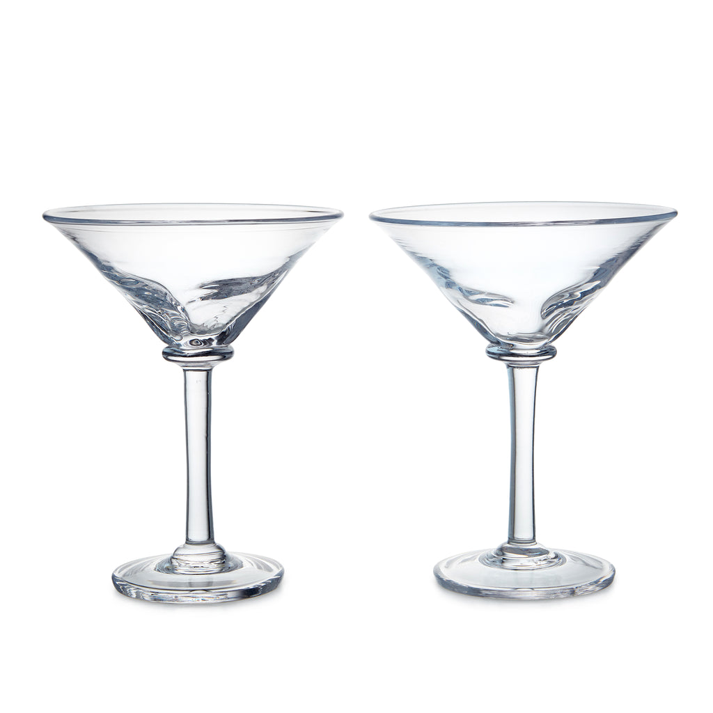 Two empty, clear Simon Pearce Woodbury Martini Glasses from the Woodbury Martini Glass Gift Set are side by side on a white background, highlighting their elegant contemporary silhouette.