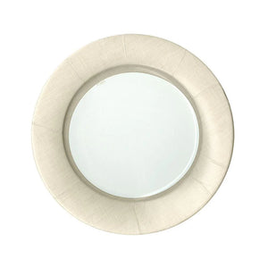 Round wall mirror with a wide, beige fabric frame, photographed on white—perfect for pairing with Caspari’s Linen Natural Paper Plate Collection at your next gathering.