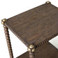Julian Chichester Bobbin Side Table, a two-tier rustic oak table featuring bobbin legs and aged brass corner accents.