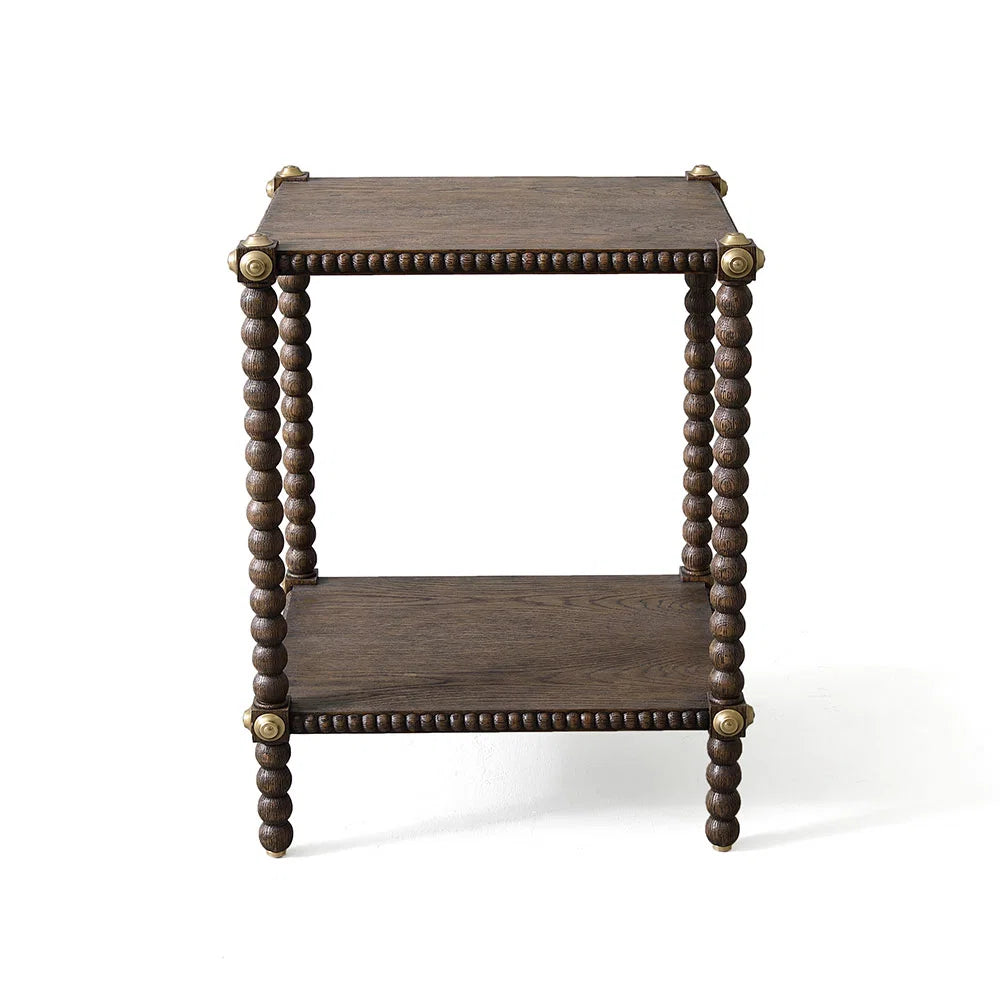Square two-tier rustic oak Julian Chichester Bobbin Side Table with bobbin legs and metal corner accents.