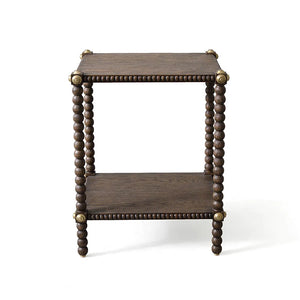 Square two-tier rustic oak Julian Chichester Bobbin Side Table with bobbin legs and metal corner accents.