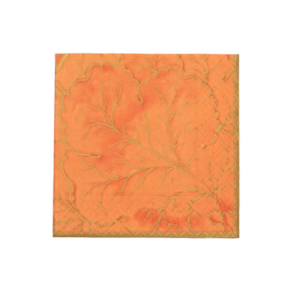 Gilded Majolica Coral Collection orange paper napkin by Caspari, featuring an embossed decorative leaf and vine pattern, offers stylish disposable tableware for any occasion. Set against a white background.