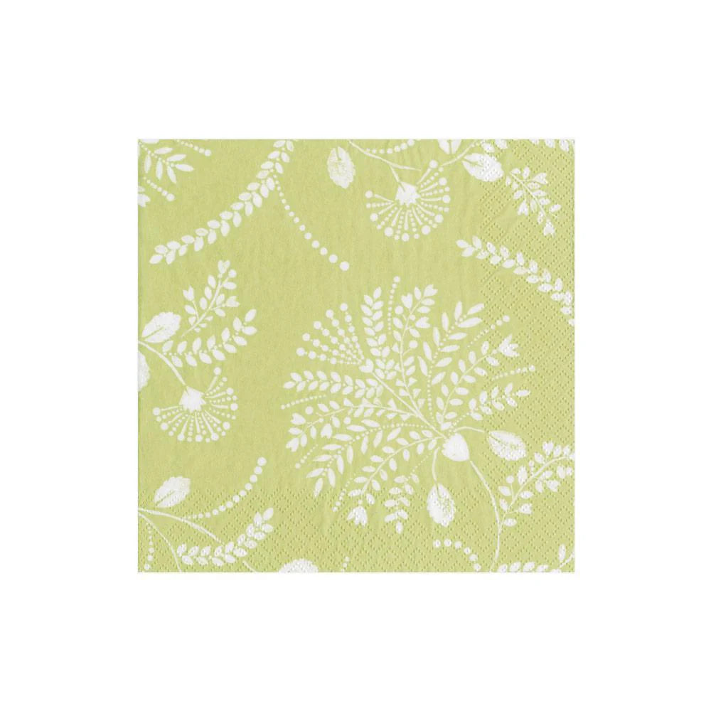 The Caspari Trailing Floral Pale Green Collection features biodegradable green napkins with a white floral and leaf pattern, ideal for eco-friendly gatherings.