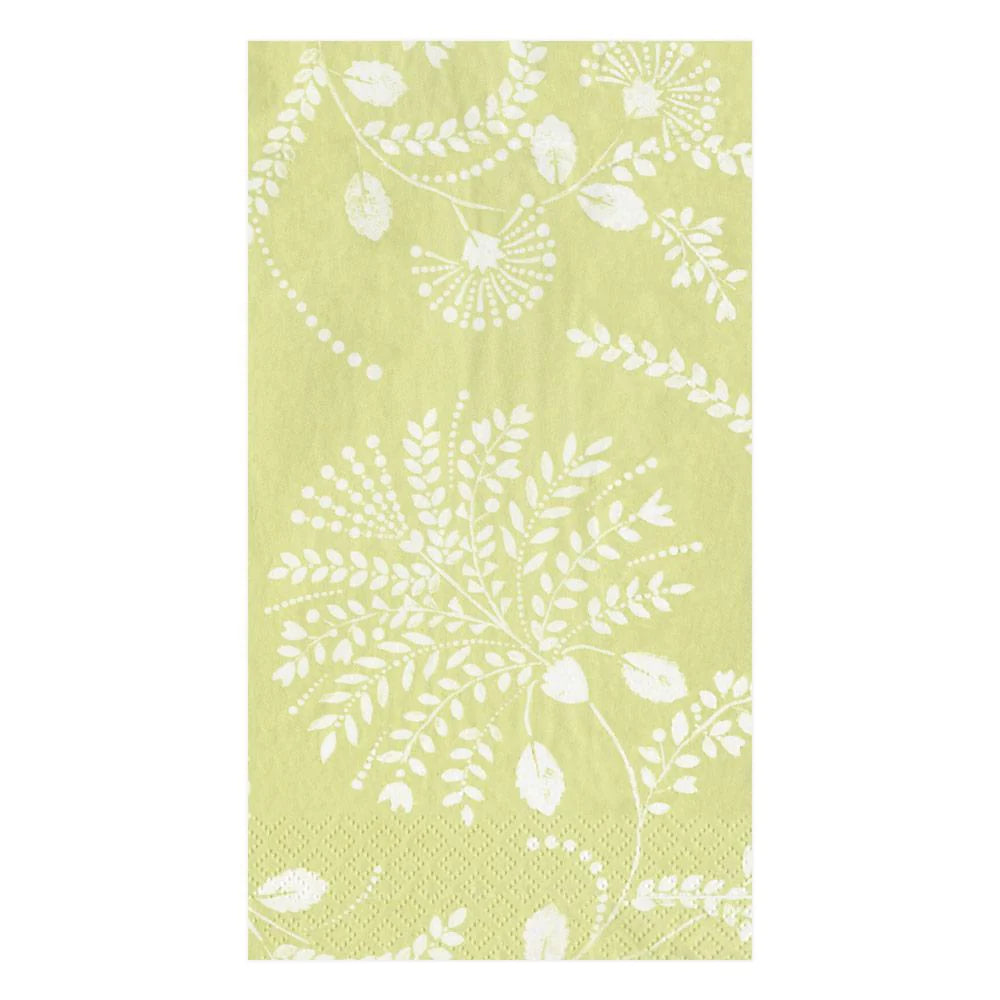 The Caspari Trailing Floral Pale Green Collection napkin features a light green triple-ply design with white floral and leaf patterns plus decorative dots—blending style and durability.