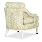 The Highland House Atchison Slipper Chair features pale green and white Botanical Citron floral upholstery, shown from the back with smooth-finished white wooden legs.