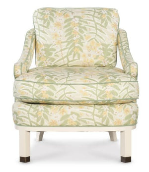 The Atchison Slipper Chair by Highland House features a light green and yellow botanical citron floral fabric, a cushioned seat and backrest, and wooden legs finished in crisp white.